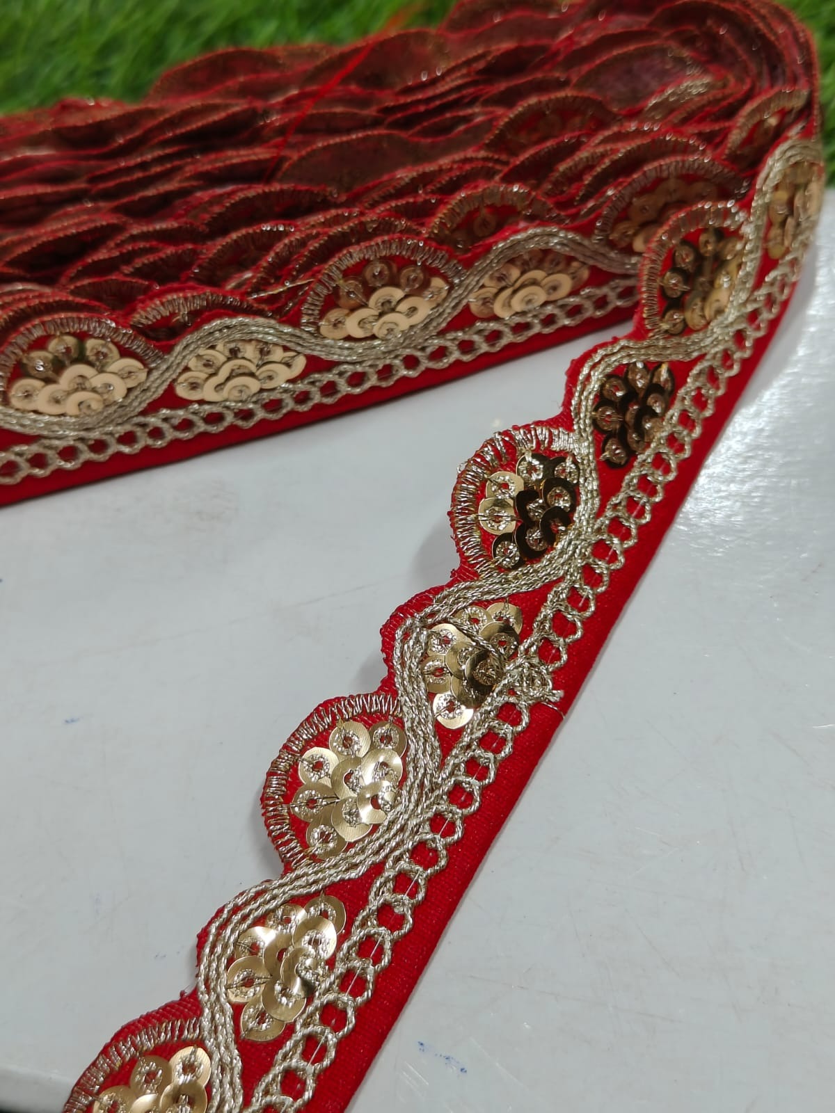 JOLLY COUNTER PRESANT A NEW LACE IN EMBRODARY WITH SEQUANCE IN RED COLOR AND 1 INCH SIZE IN 9 MEETER LENGTH. - Image 1